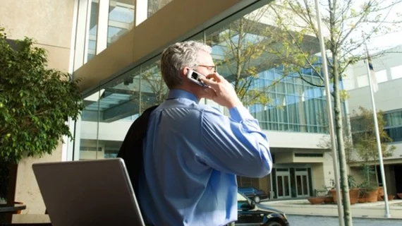 CIO on the phone at a hospital.